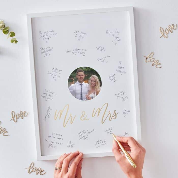 bdba0af344cc4df14a340f617bcaabf006426c3c.jpg Guest Book - Mr And Mrs Signing Frame - Image 1